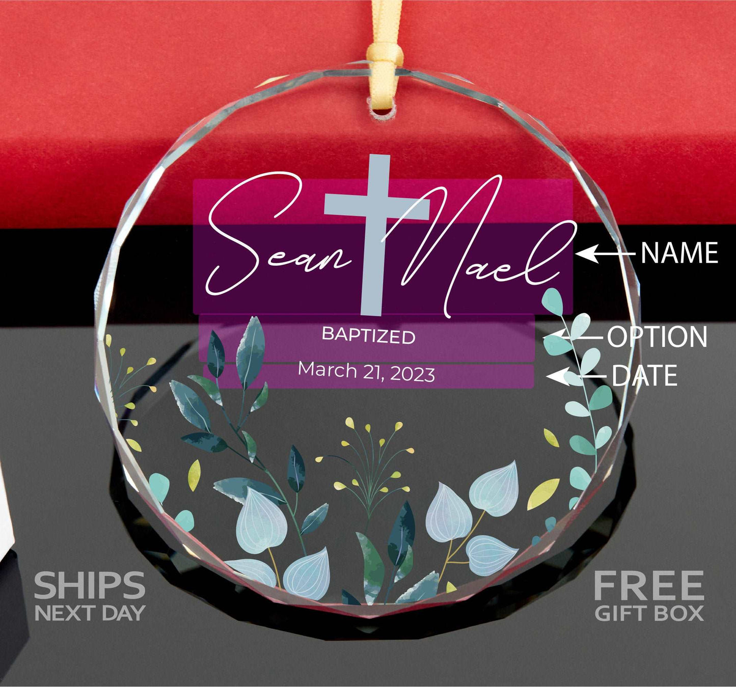 a glass ornament with a cross on it