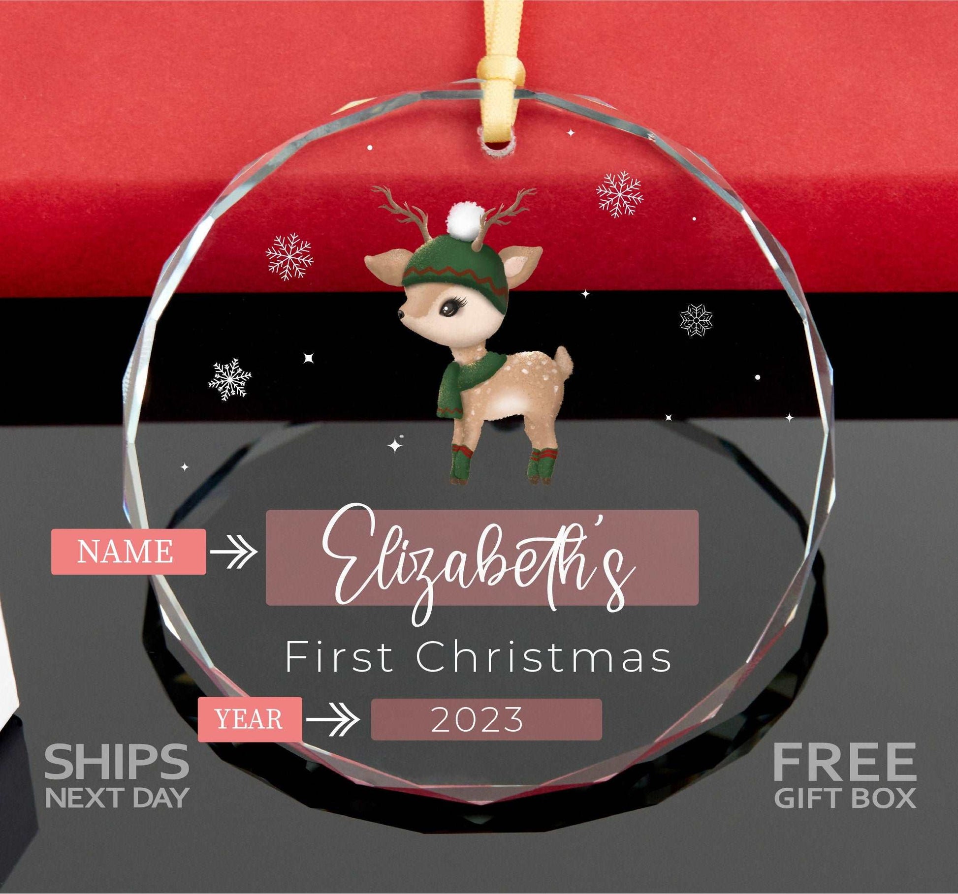 a glass ornament with a reindeer on it