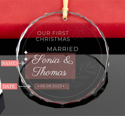 a glass ornament with a name and date on it