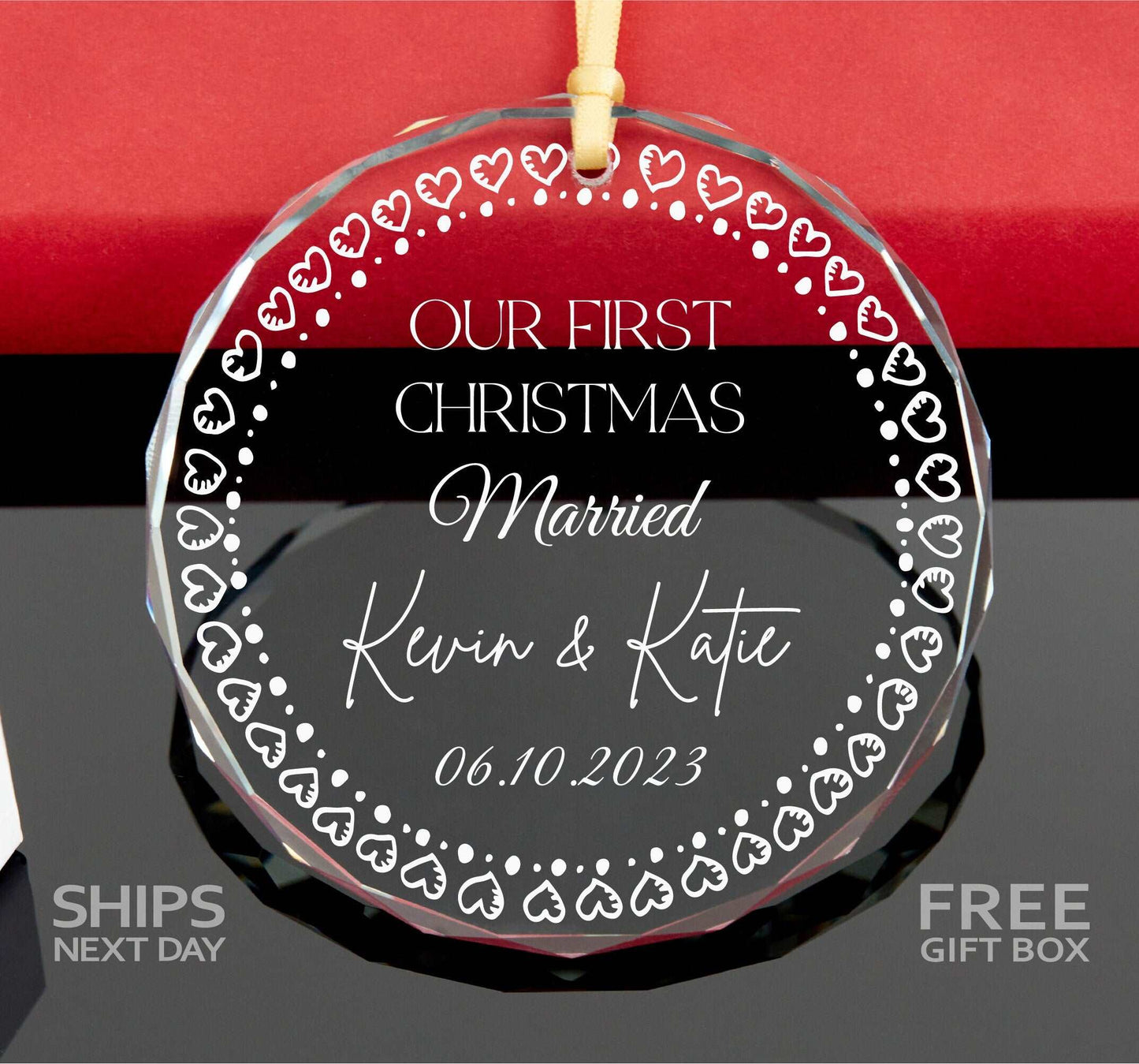 a glass ornament with a couple's names on it