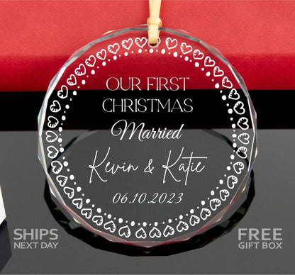 a glass ornament with a couple's names on it