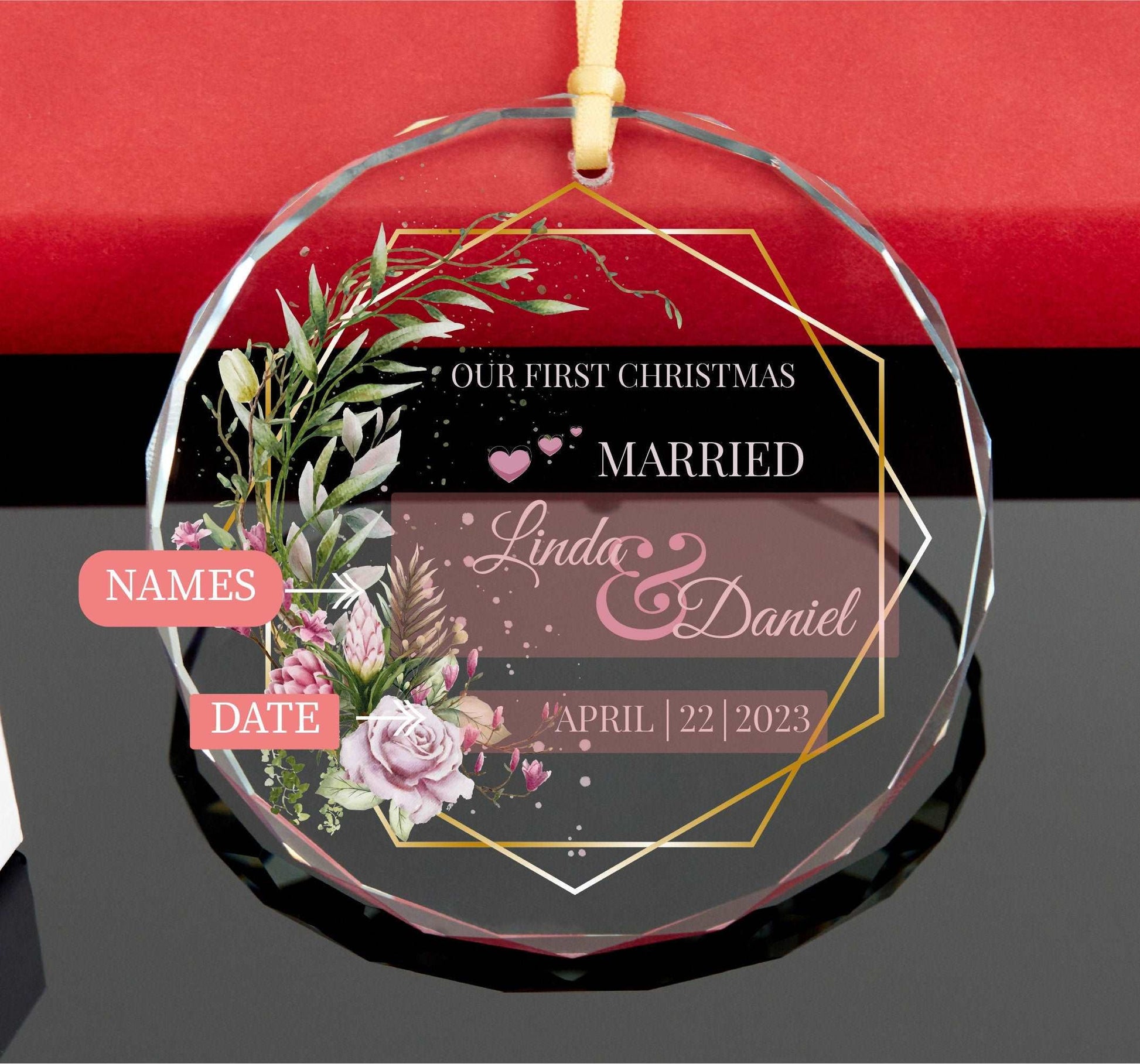 a glass ornament with a floral design on it