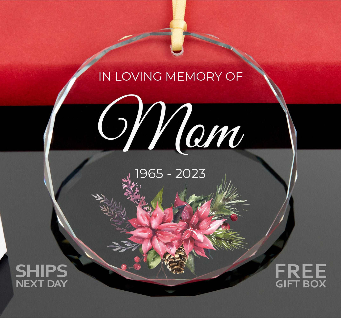 a glass ornament with a picture of flowers on it