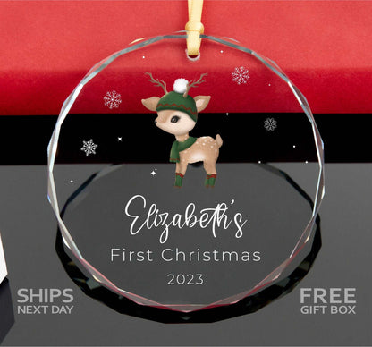 a glass ornament with a reindeer on it