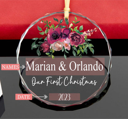 a personalized glass ornament with flowers on it