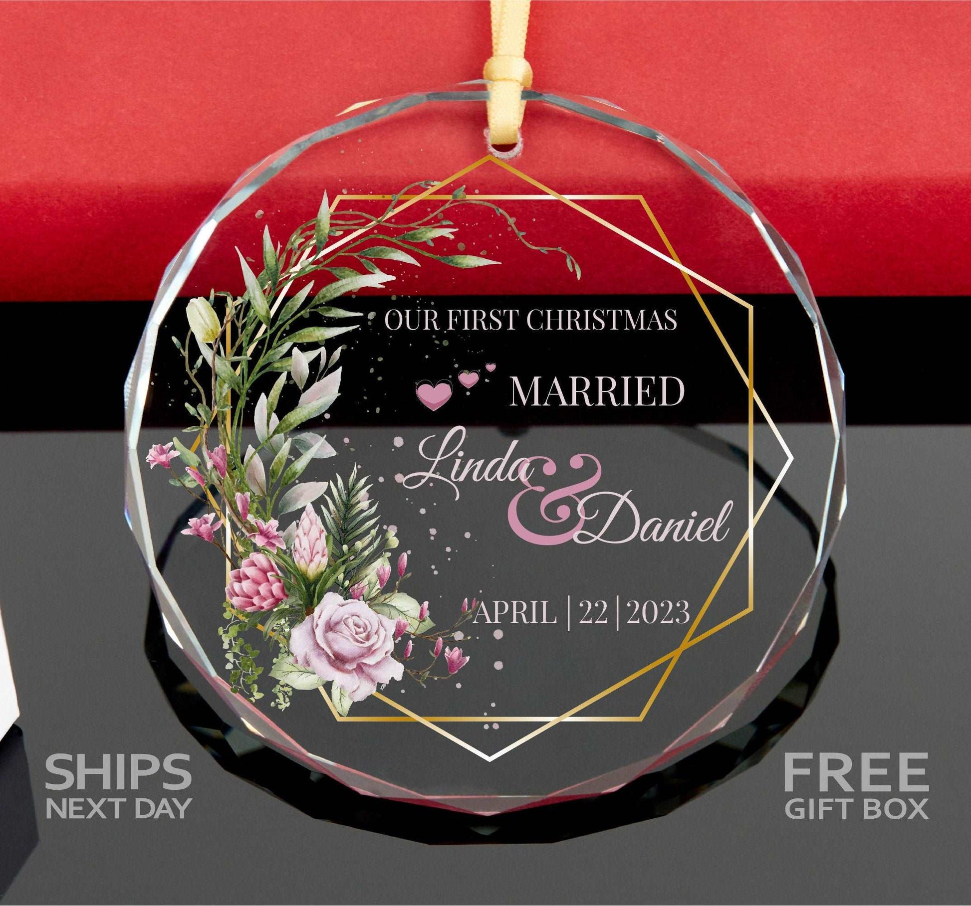 a glass ornament with a floral design on it