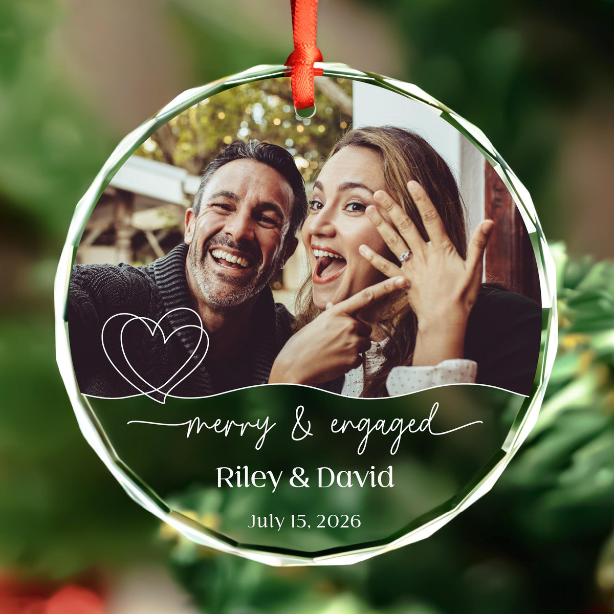 Personalized Merry and Engaged round glass photo ornament with heart line design, names and date