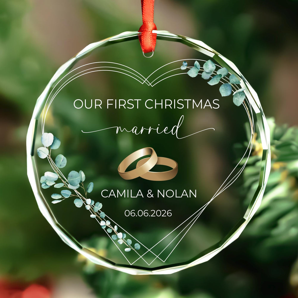 Engaged ornament with gold engagement rings in round and heart glass shapes