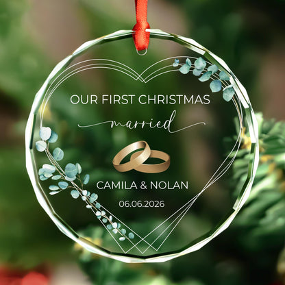 Engaged ornament with gold engagement rings in round and heart glass shapes