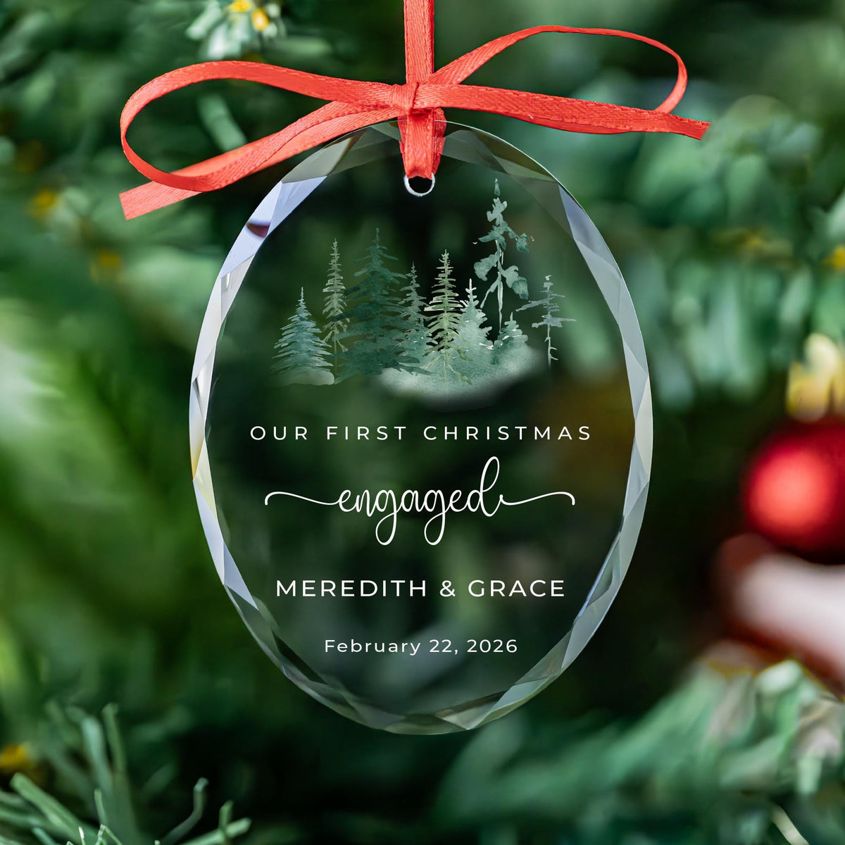 Personalized first Christmas engaged oval glass ornament with watercolor forest, names and date