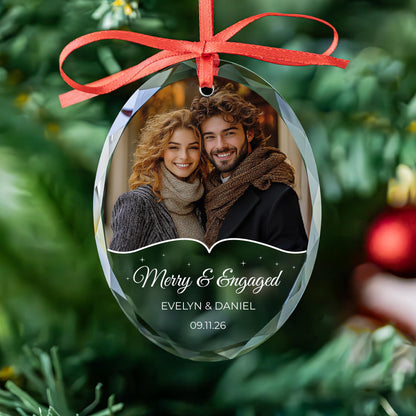 Personalized Merry and Engaged oval glass photo ornament with sparkle wave design, names and date