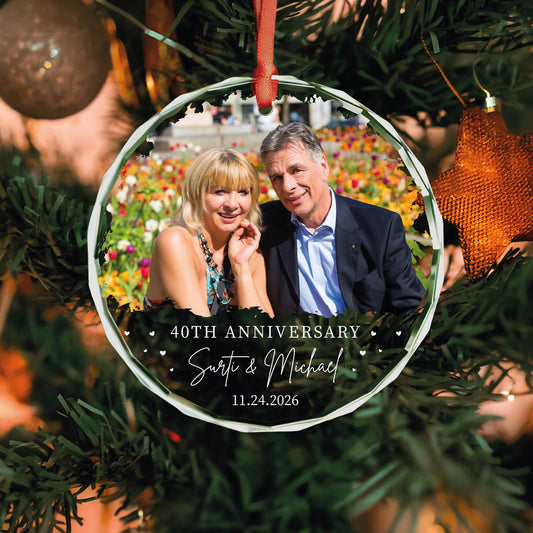 Personalized golden 50th anniversary glass ornament with couple photo, names and date