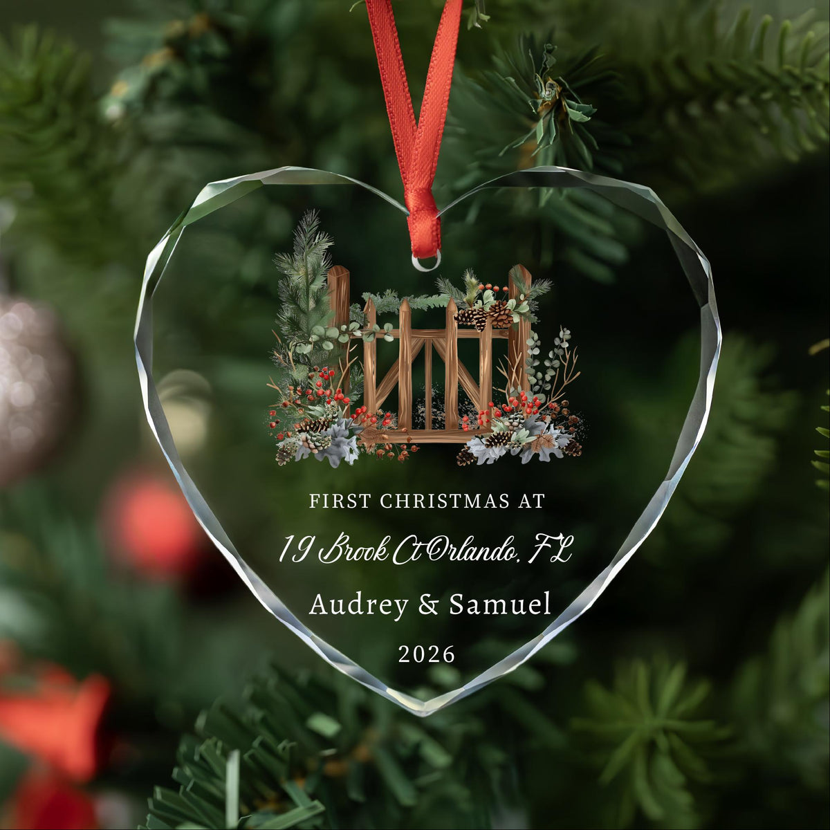 Personalized first Christmas at new home heart glass ornament with wooden gate and pine berries, address, names and year