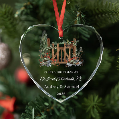 Personalized first Christmas at new home heart glass ornament with wooden gate and pine berries, address, names and year